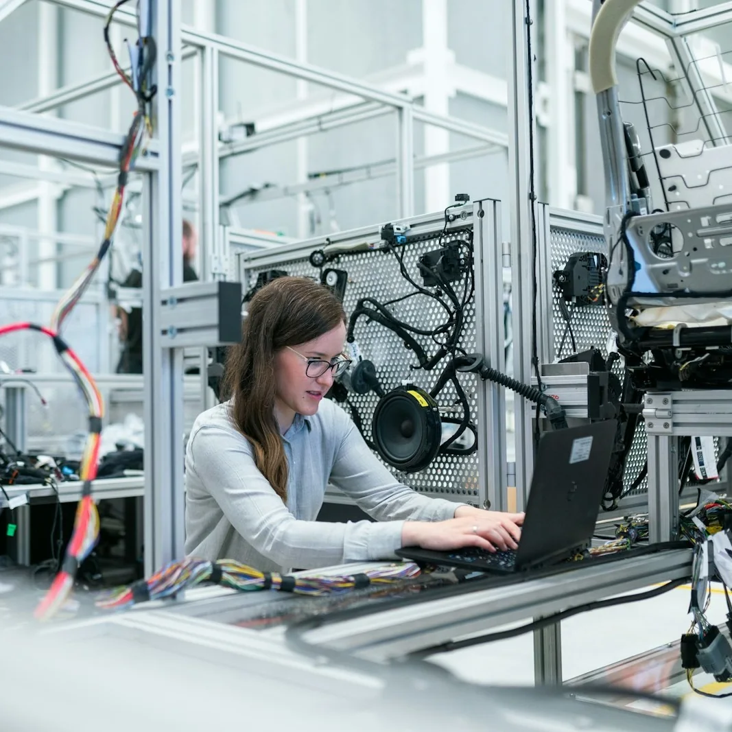 Researcher working at a laboratory test setup