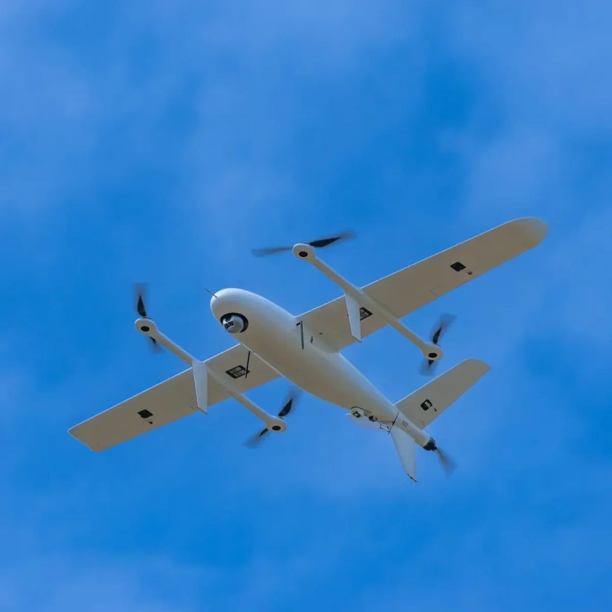 VTOL UAV with lift rotors in flight